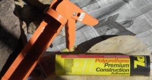 A caulking gun and polyurethane caulk for an adhesive
