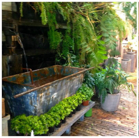 A beautiful aged copper trough for a water feature